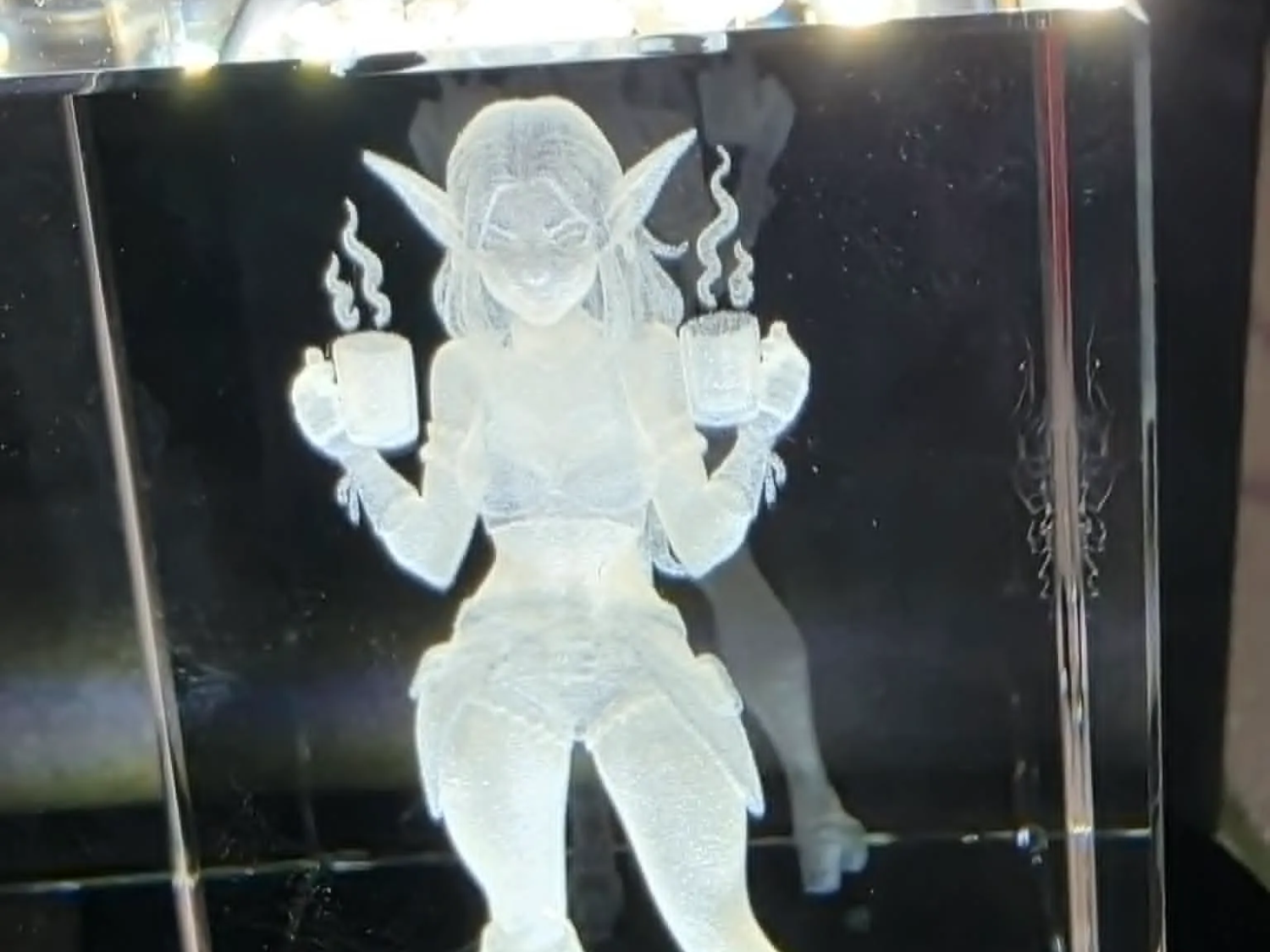 Crystal Cube Featuring a Goblin Character Holding Two Steaming Mugs