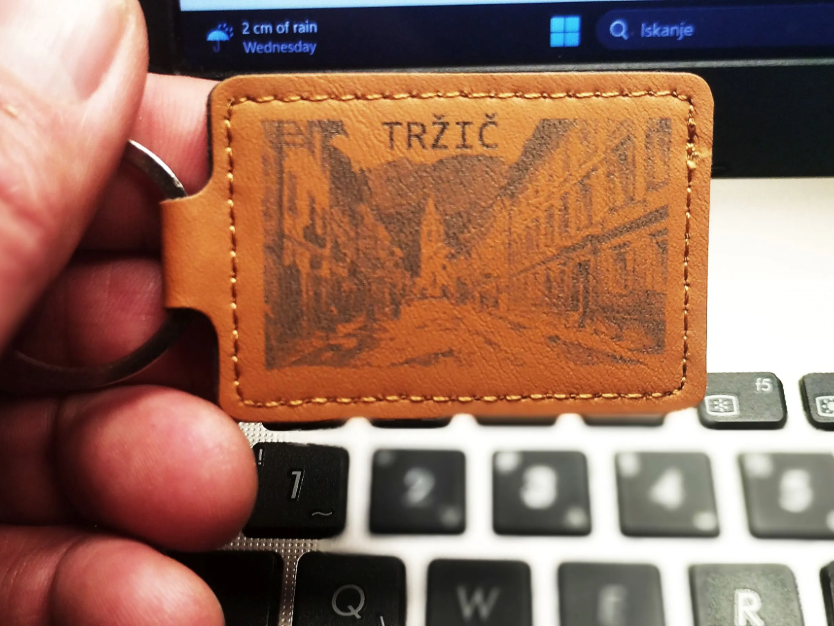 Tržič Slovenia leather keychain with town street view