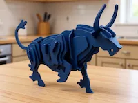 [Laser cut and engrave] Blue Layered Bull Figurine Standing on Wooden Surface