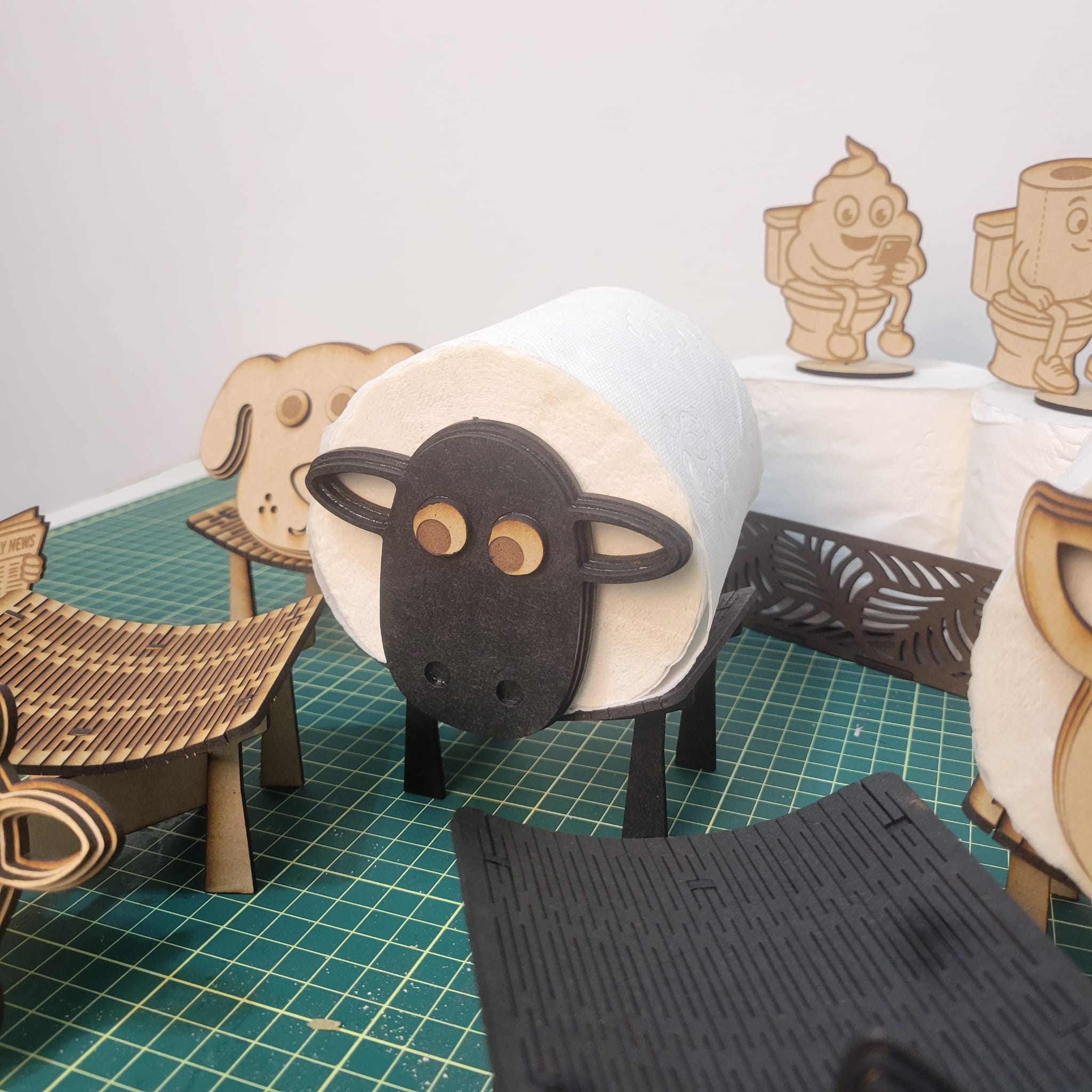 Soportes para papel higiénico con formas de animales y personajes divertidos 2