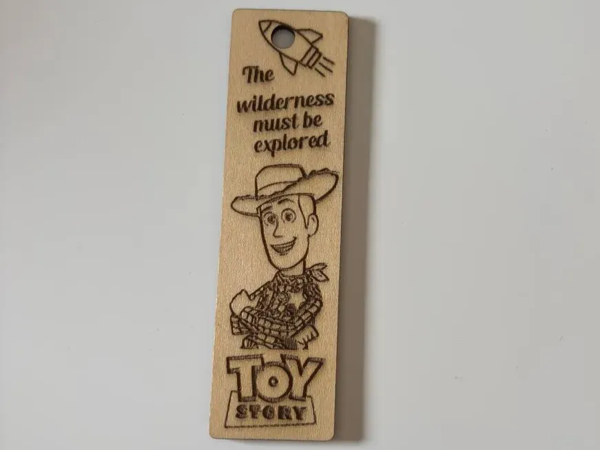 Toy Story Woody Wooden Bookmark with The Wilderness Must Be Explored Quote
