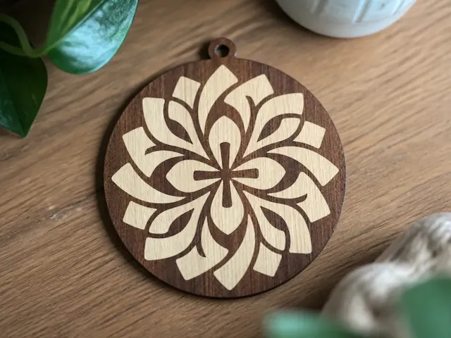 Round Wooden Ornament with Geometric Flower Mandala Pattern