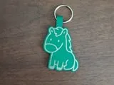 [Laser cut and engrave] Green Horse Shaped Leather Keychain