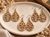 [Laser cut and engrave] Teardrop shaped wooden earrings with intricate floral cutouts