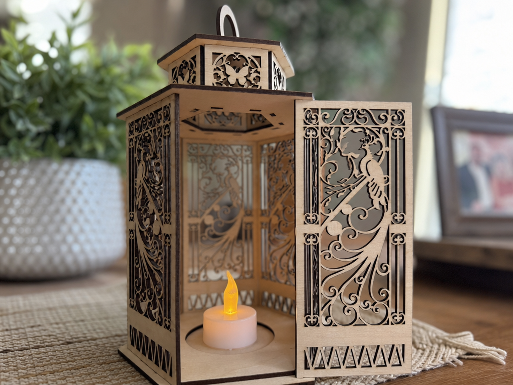 Tall wooden lantern with peacock cutout panel and flameless tealight outdoor lantern idea