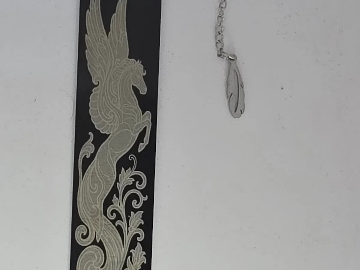 [Laser cut and engrave] Black Bookmark Featuring an Elegant Winged Pegasus and Feather Charm