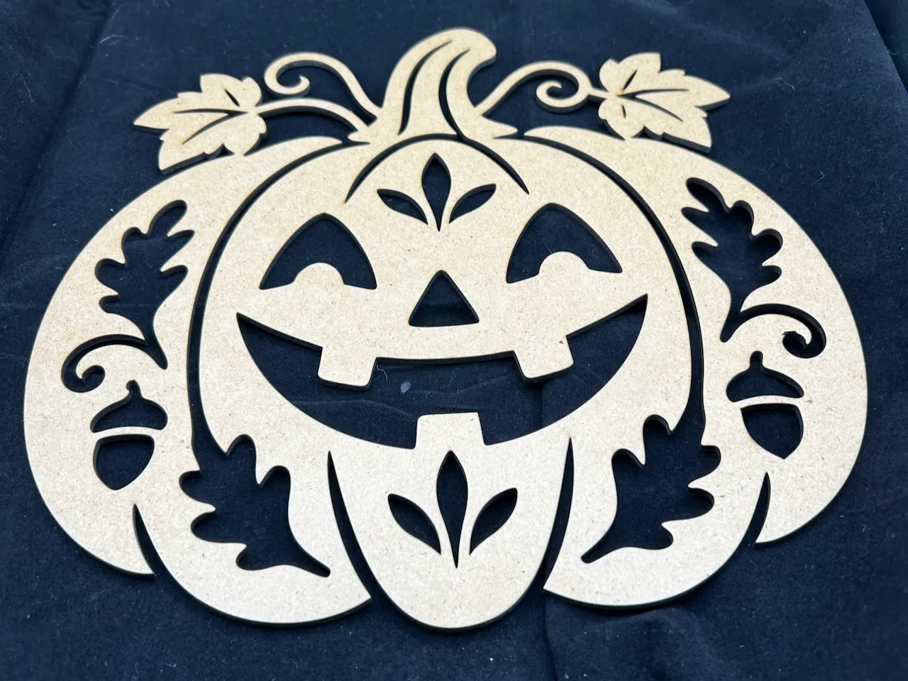 [Laser cut and engrave] Jack-o'-lantern pumpkin wall hanging with leaf and acorn accents