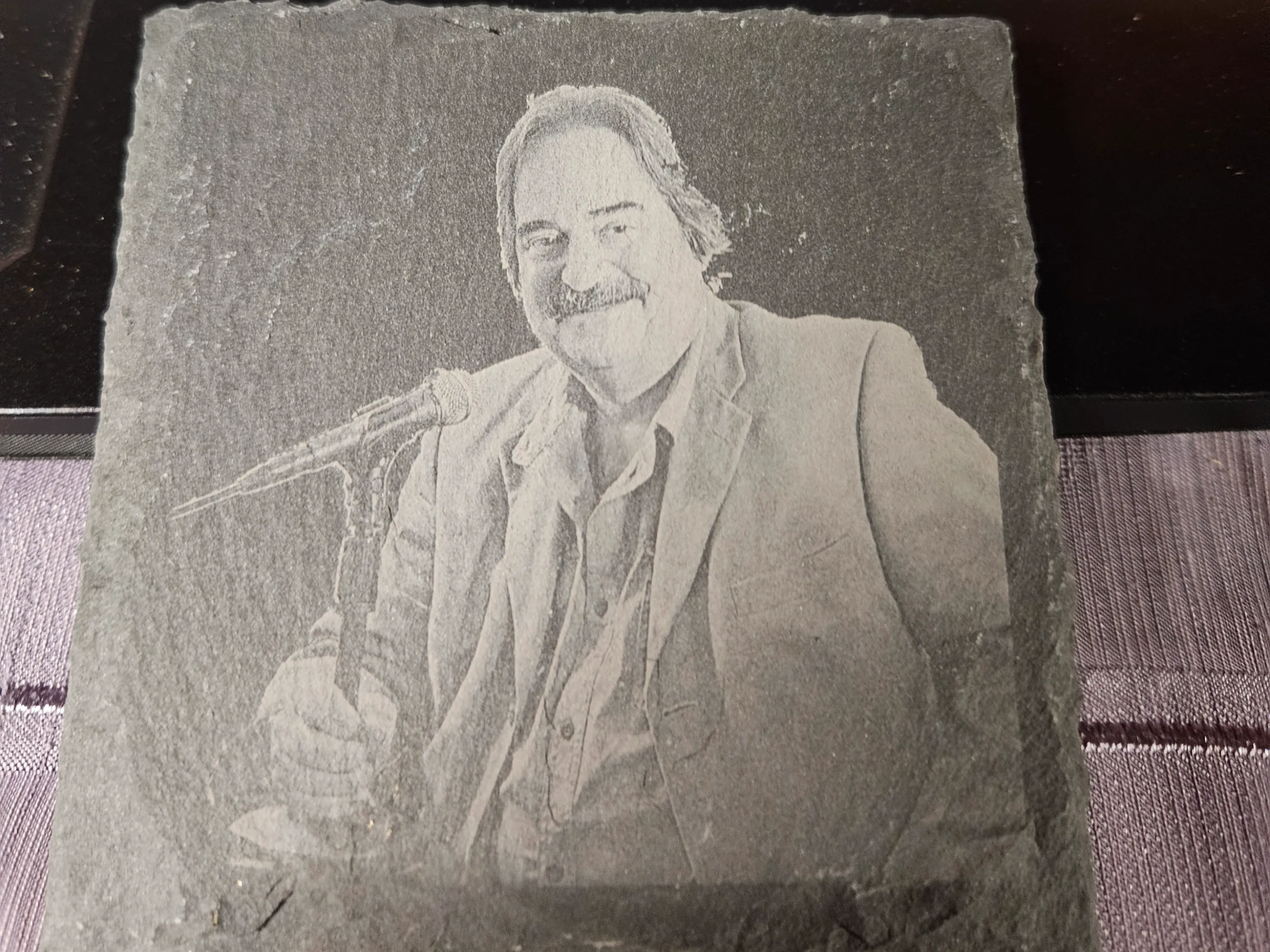 Slate Coaster Featuring Portrait of a Man with a Microphone