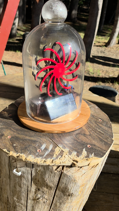 [Laser cut and engrave] Kinetic Solar Powered Spinning Wheel Sculpture in Glass Cloche