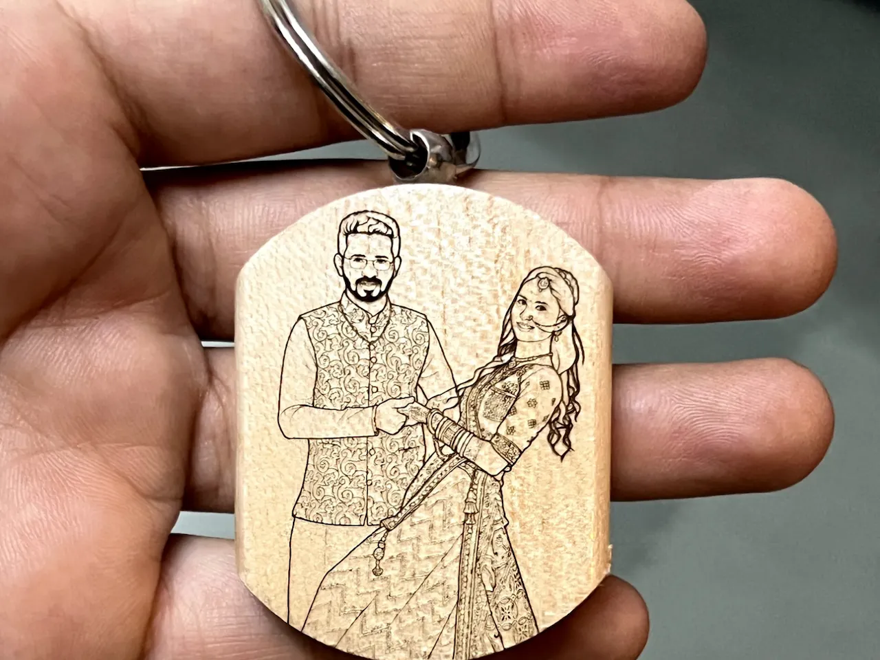 [Laser cut and engrave] Wooden keychain featuring a portrait of an Indian wedding couple