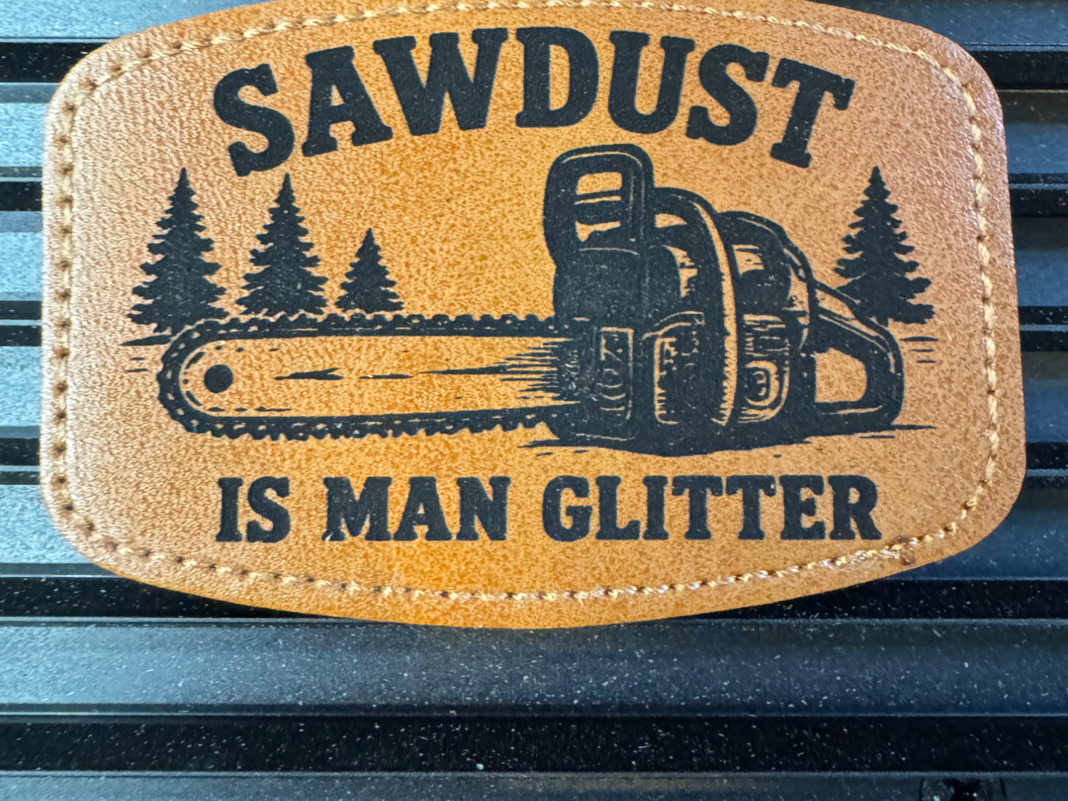 Sawdust Is Man Glitter Leather Patch with Chainsaw