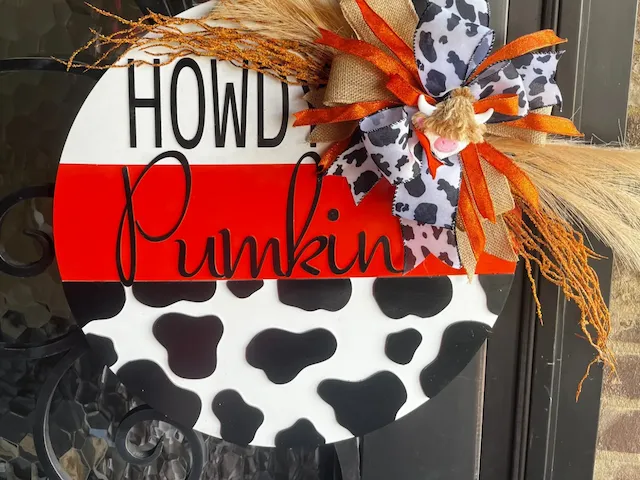 Howdy Pumpkin Cow Print Round Front Door Sign