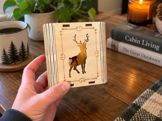 Wooden box with deer silhouette cutout