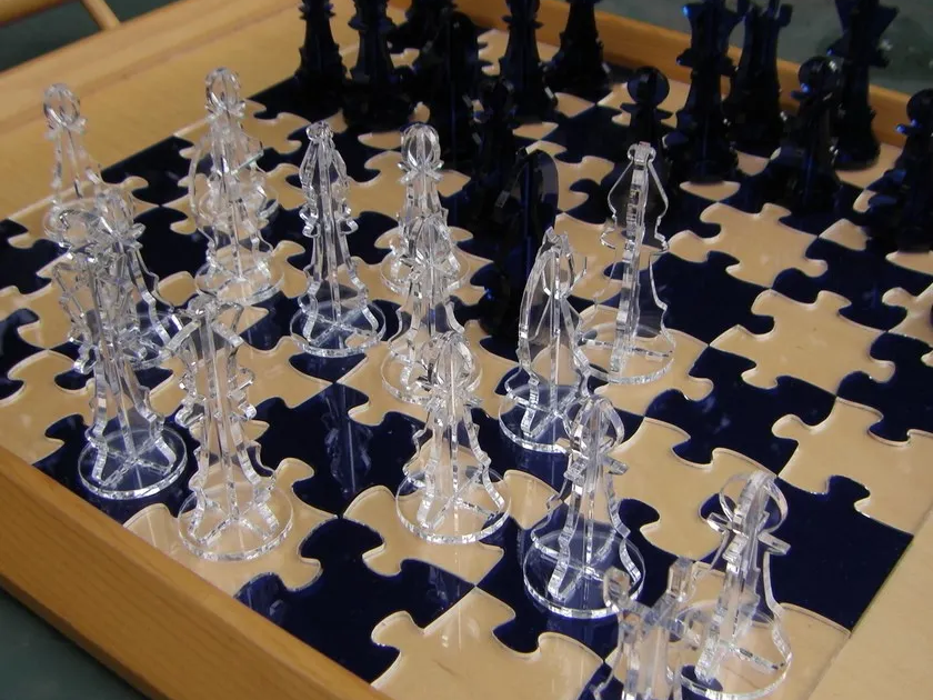 Clear and Black Acrylic Chess Set with Interlocking Puzzle Piece Board