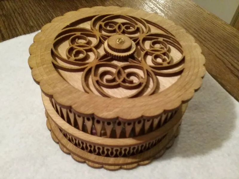 Round Wooden Keepsake Box with Intricate Filigree Lid