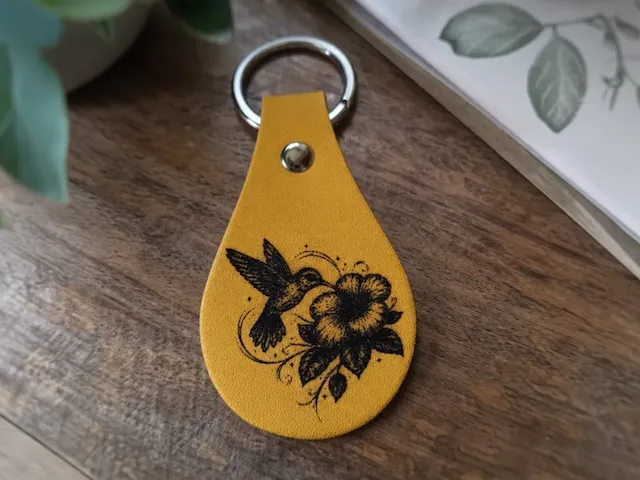 Yellow Leather Keychain with Hummingbird and Flower Illustration