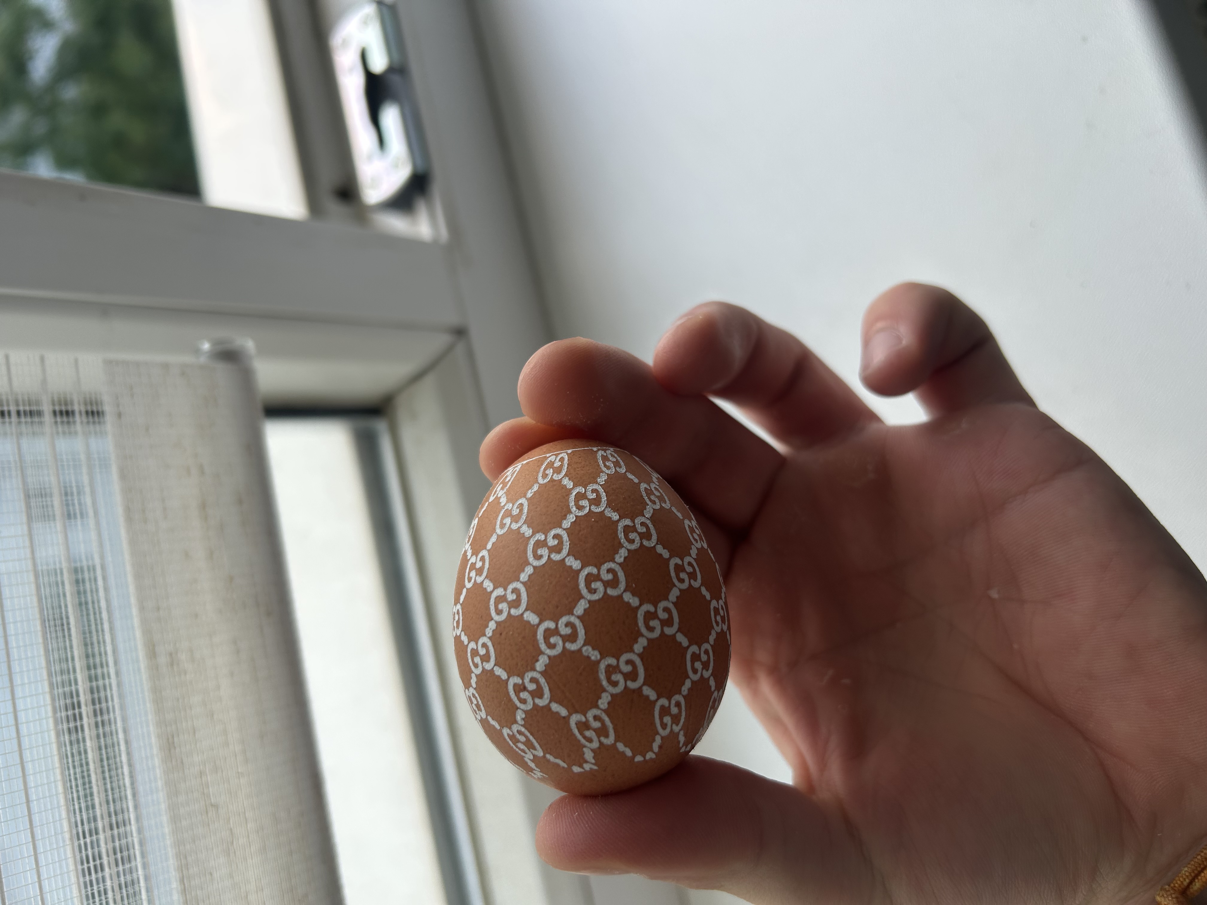 [Laser cut and engrave] Brown Egg with White Interlocking GG Monogram Pattern