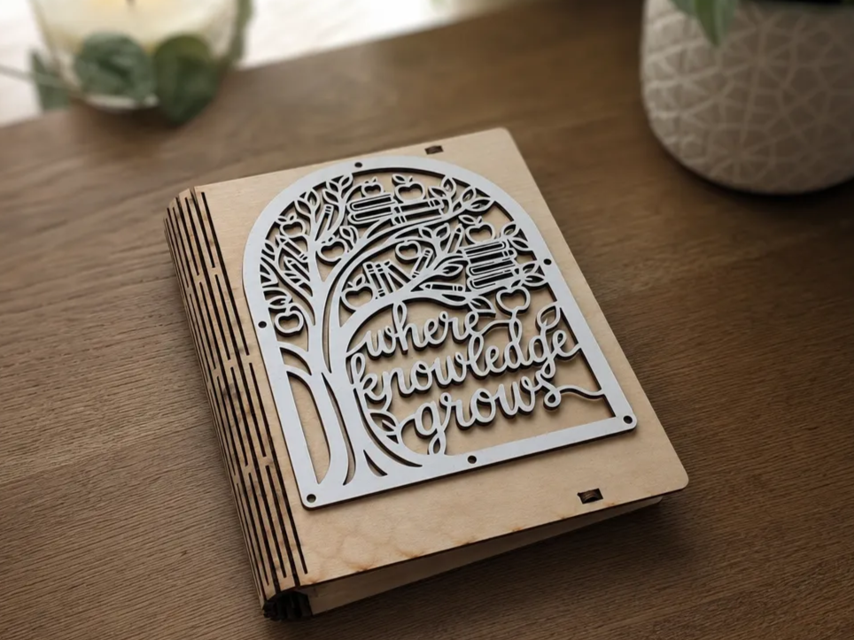 Where Knowledge Grows Wooden Book Cover with Tree and School Supplies Motif
