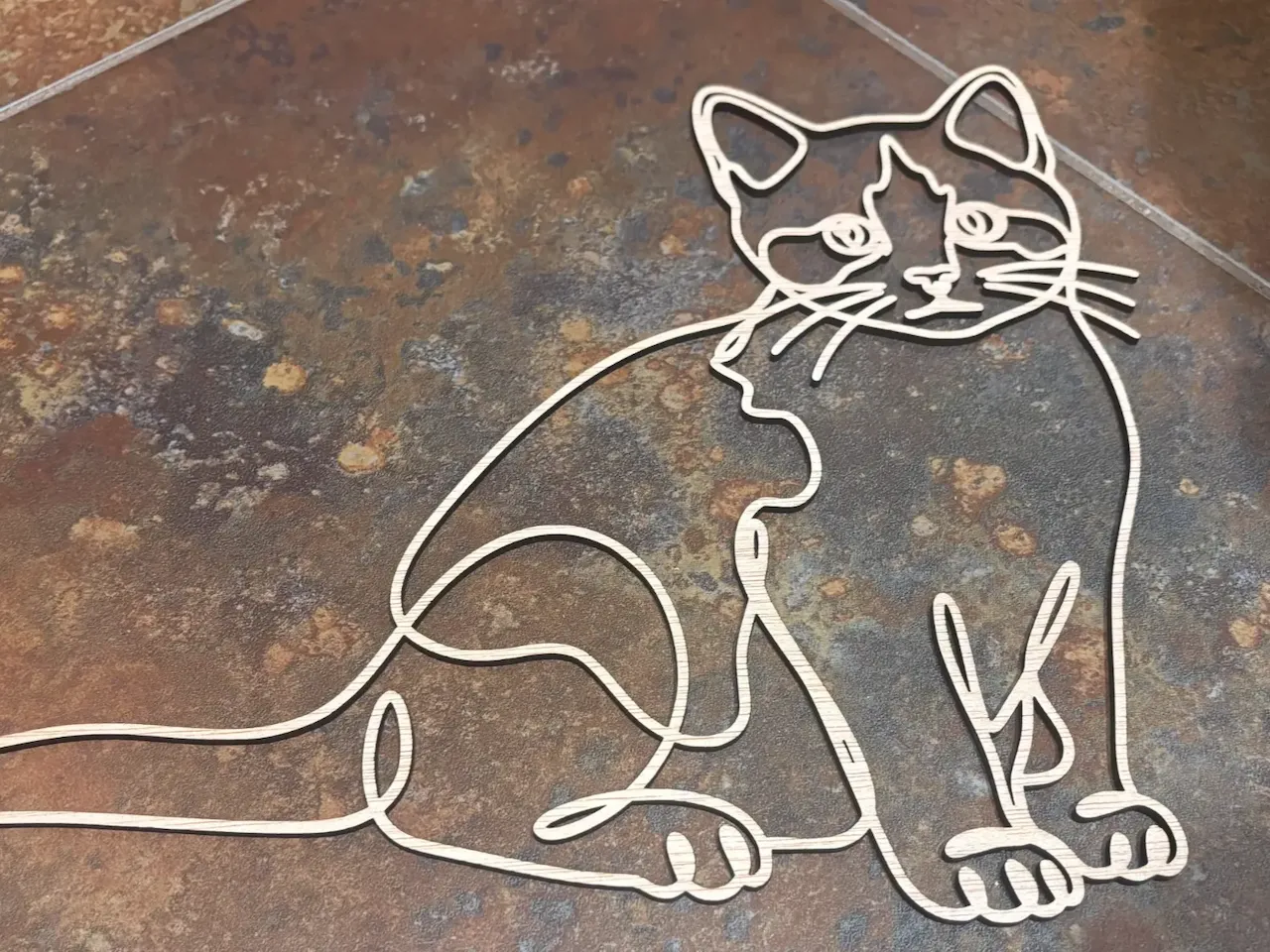 [Laser cut and engrave] Silueta de gato en una sola línea para pared