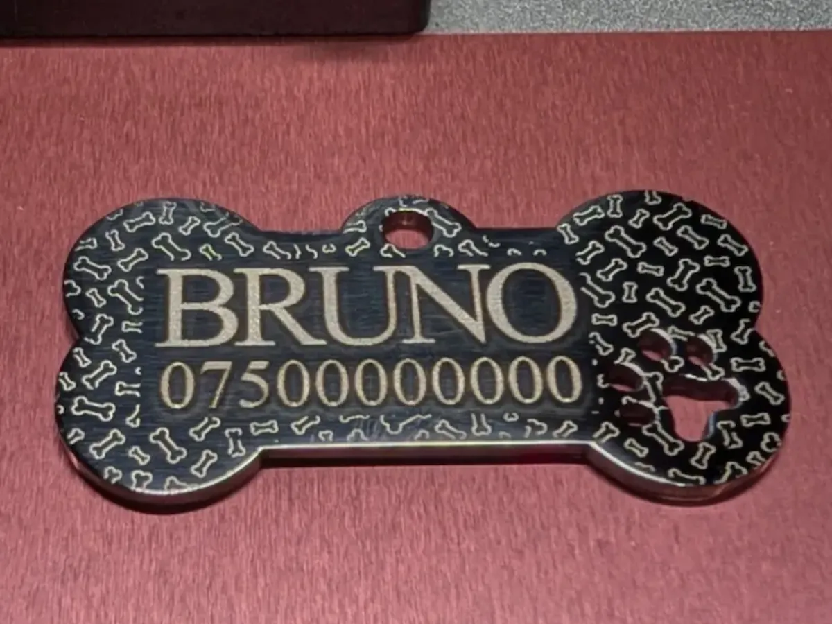[Laser cut and engrave] Bone-shaped pet ID tag with paw print and bone pattern