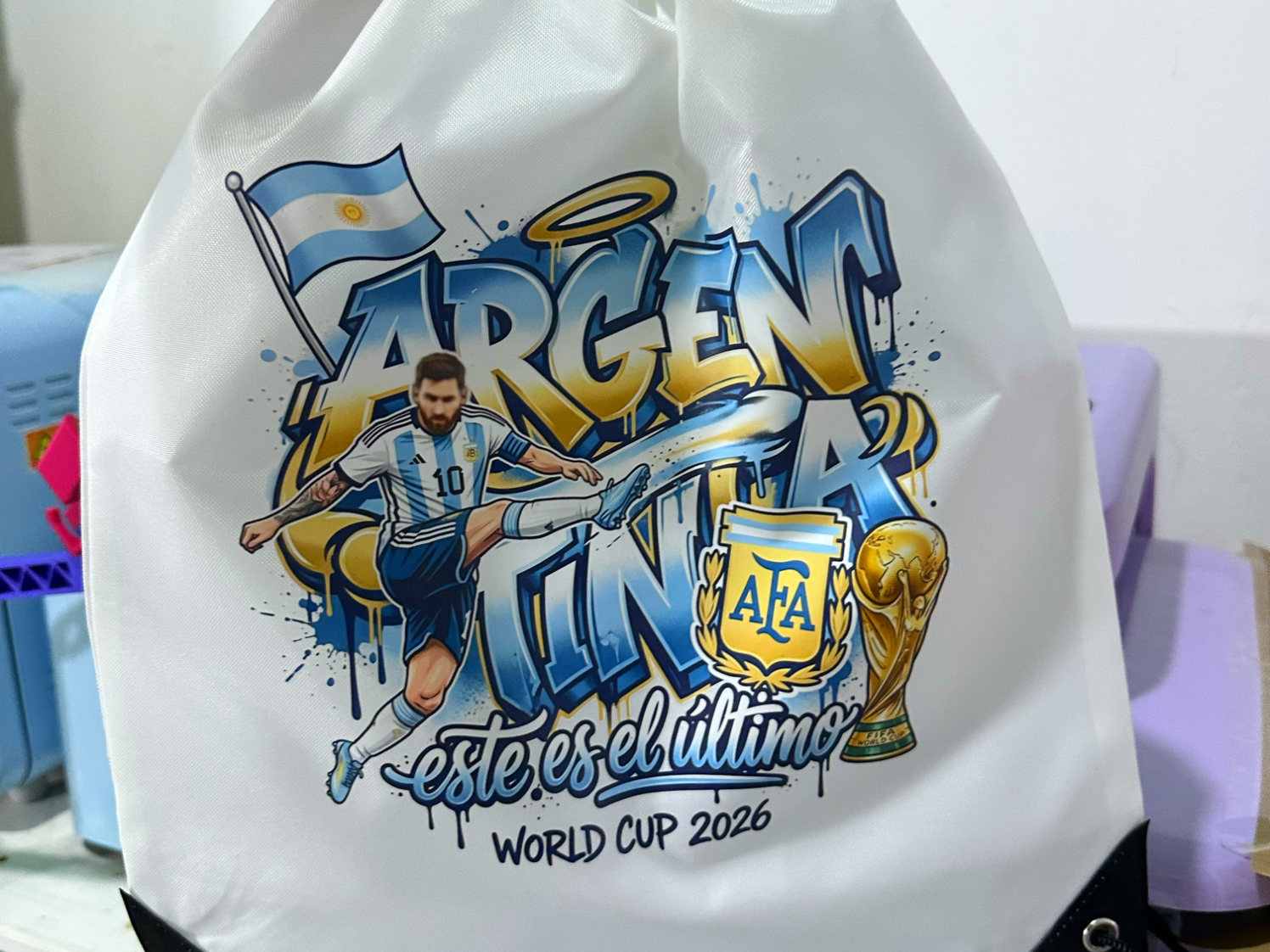 Mochila, posavasos y llavero con estampado de Argentina y Messi