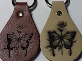 [Laser cut and engrave] Brown Leather Teardrop Keychain with Butterfly and Rose Motif