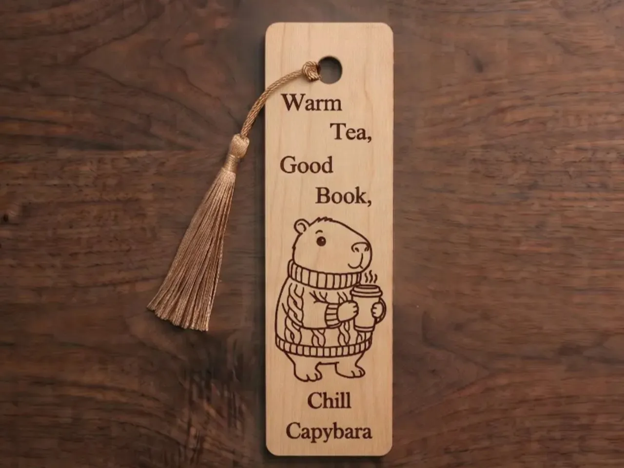 [Laser cut and engrave] Wooden Bookmark Featuring a Cozy Capybara with Warm Tea and Book Quote