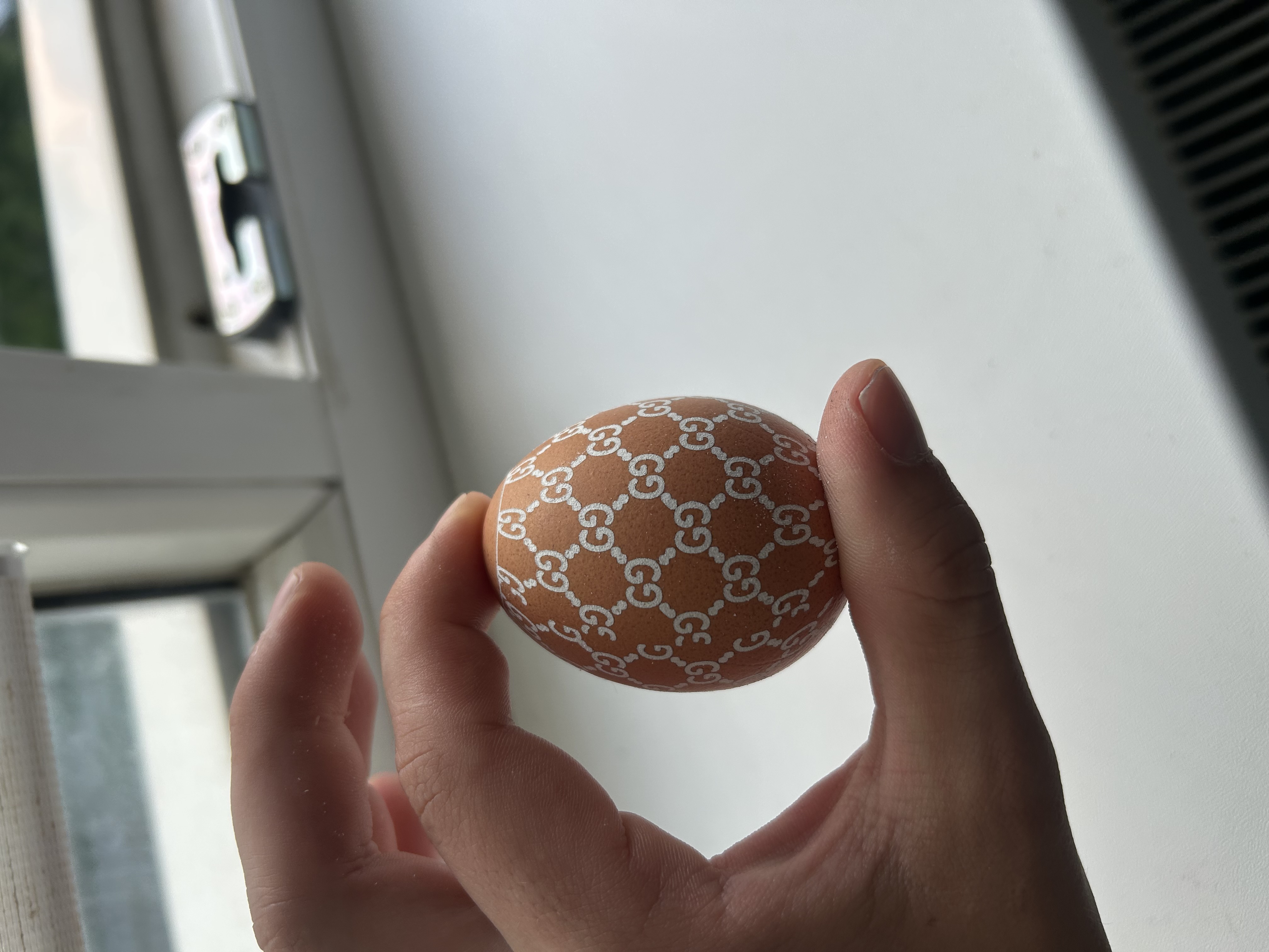 [Laser cut and engrave] Brown Egg with White Interlocking GG Monogram Pattern