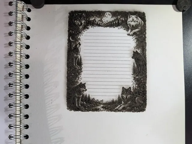 Lined Stationery Paper with Wolf and Forest Border Illustration