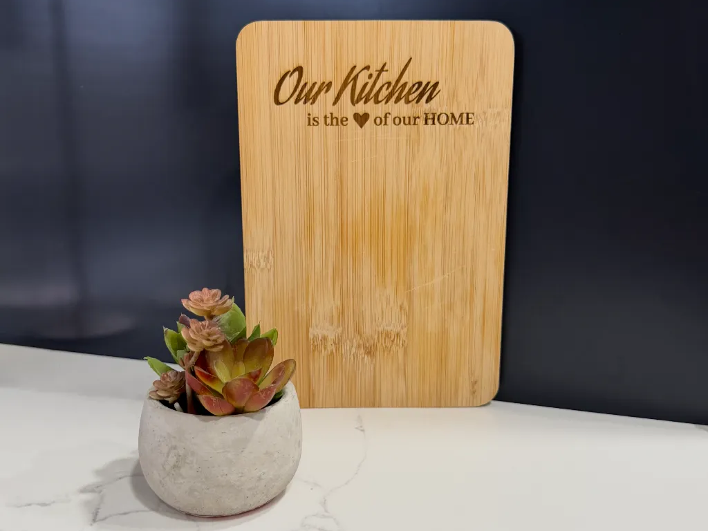 Our kitchen is the heart bamboo cutting board