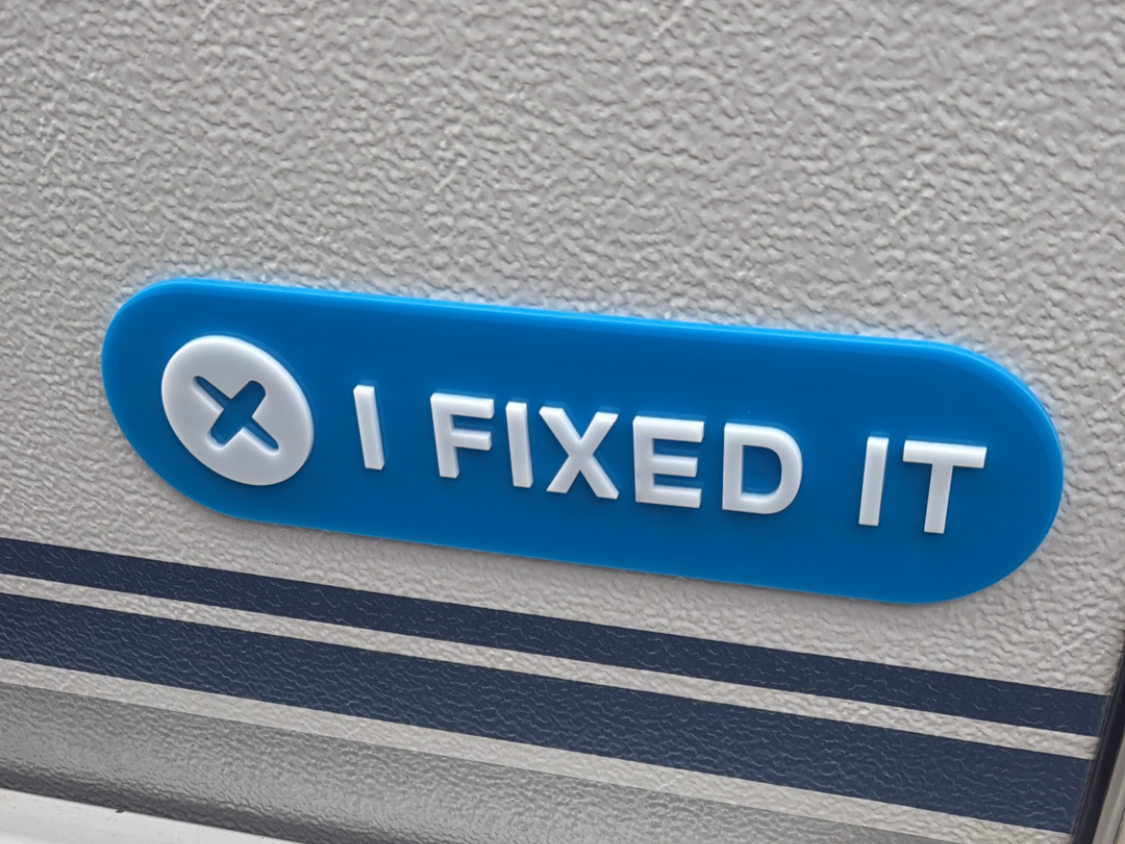 I FIXED IT Blue and White Adhesive Sign