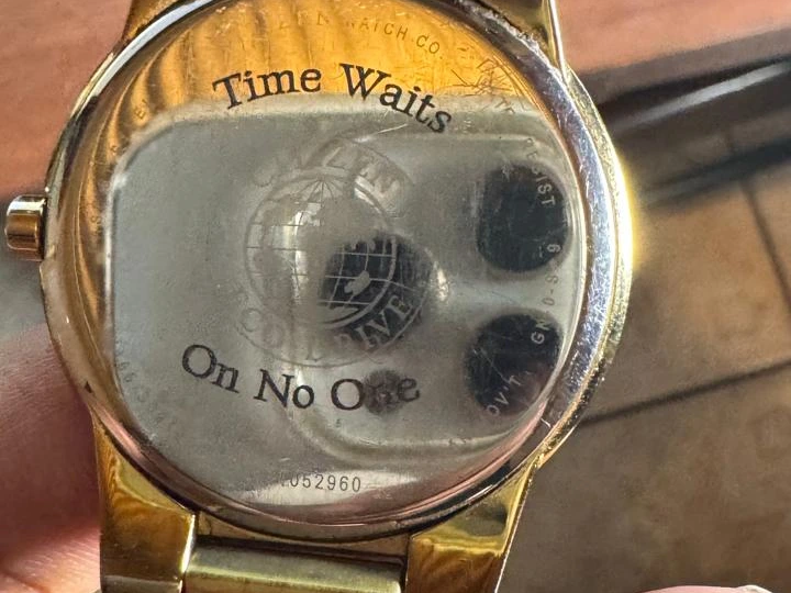 Citizen Eco-Drive Gold Tone Wristwatch with Time Waits On No One Engraving