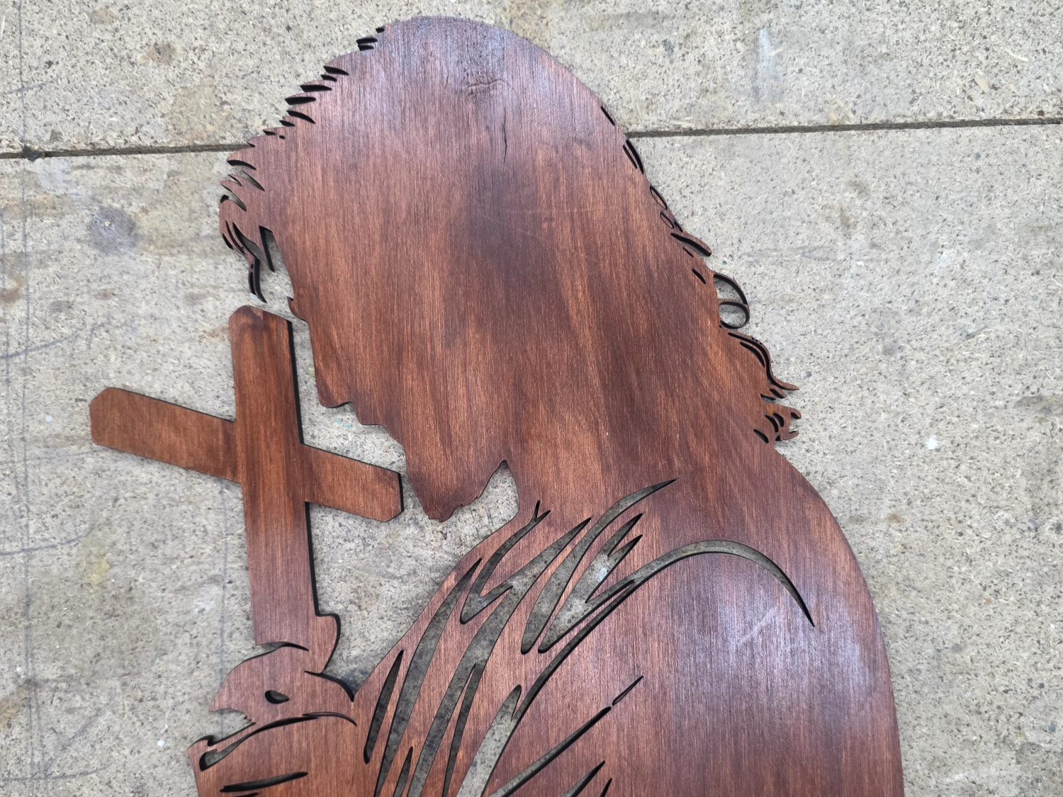 Jesus holding cross
