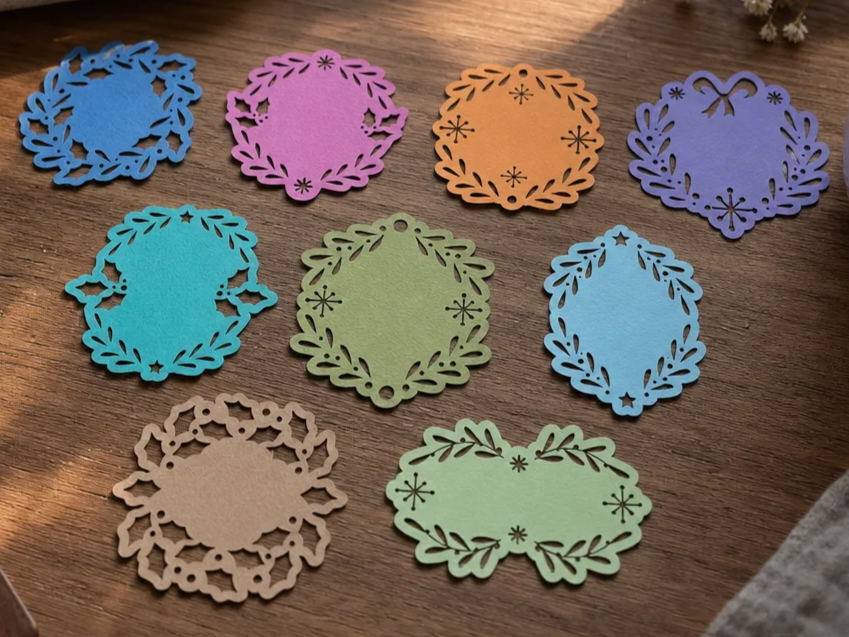 Colorful Die-Cut Paper Gift Tags with Floral and Wreath Motifs