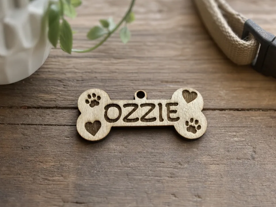 Médaillon pour chien en forme d'os personnalisé avec le nom Ozzie