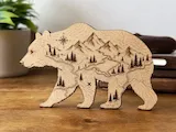 [Laser cut and engrave] Bear Shaped Wooden Cutout with Mountain Landscape and Compass Map