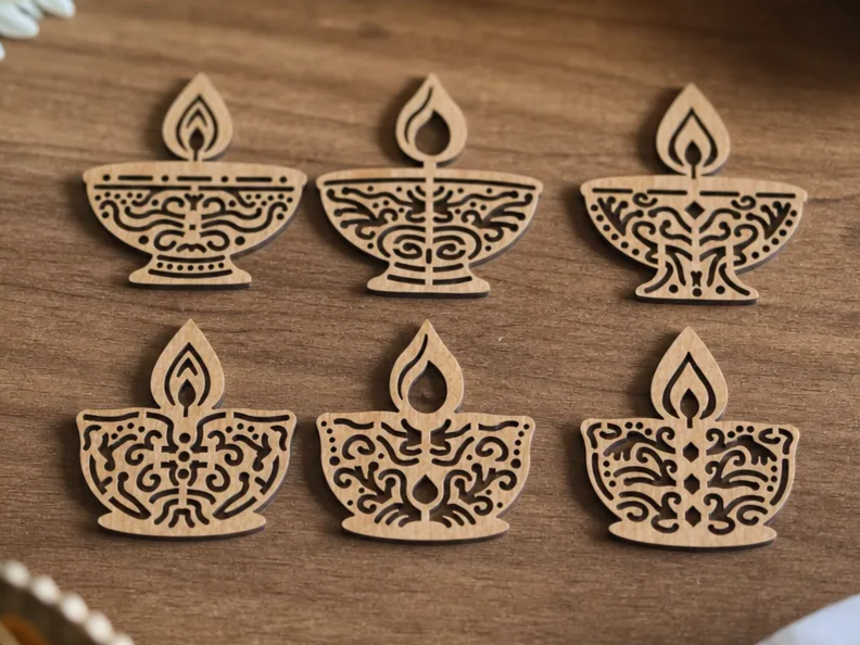 Ornate Wooden Diya Lamp Cutouts for Diwali Celebration