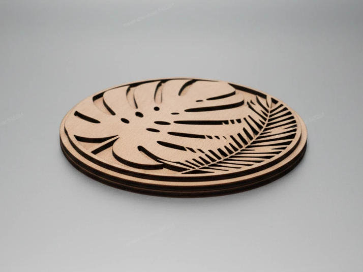 Monstera and palm leaf cutout pattern wall art