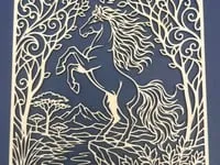 [Laser cut and engrave] Intricate Paper Cutout Art Featuring a Rearing Horse in a Forest Landscape