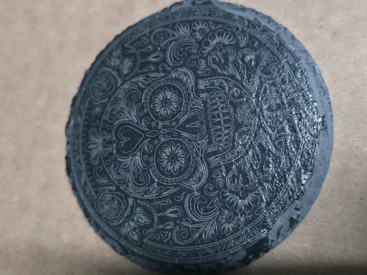 [Laser cut and engrave] Round Slate Coaster Featuring Intricate Floral Sugar Skull Design