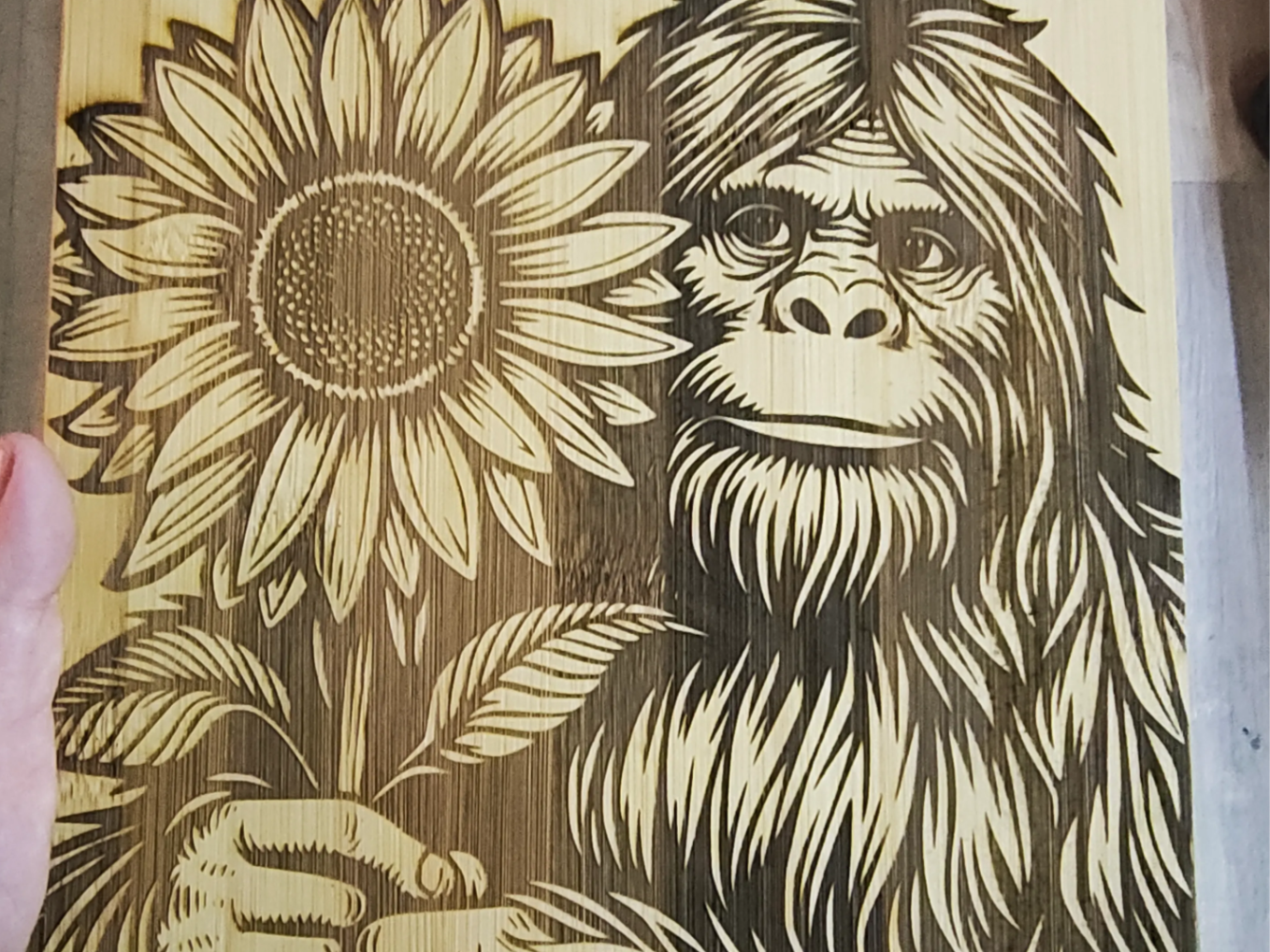 Bigfoot Holding a Sunflower Wooden Wall Art