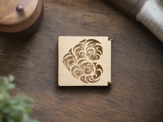Small Wooden Box with Intricate Swirl Pattern Cutout