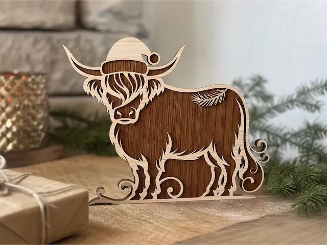 Highland Cow Wearing Santa Hat Tabletop Figure