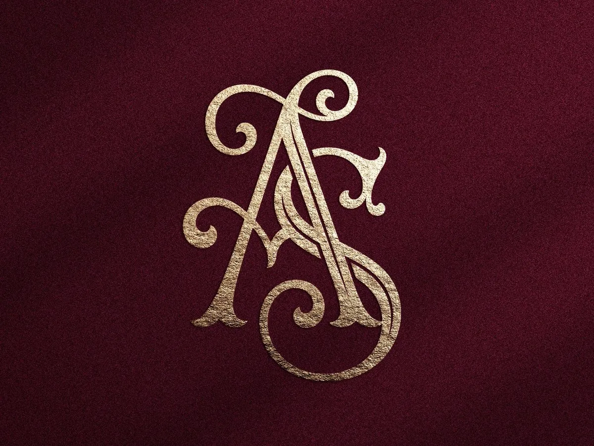 [Laser cut and engrave] Monogramme doré avec lettres entrelacées A et S sur fond texturé bordeaux