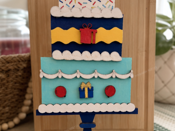 Tiered Birthday Cake Tabletop Sign with Gift and Balloon Accents
