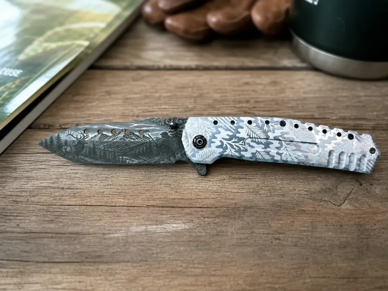 [Laser cut and engrave] Folding pocket knife with mountain landscape and forest leaf pattern