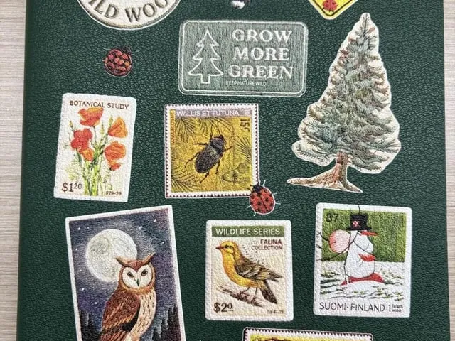 Green Journal Featuring Embroidered Nature and Wildlife Postage Stamp Motifs