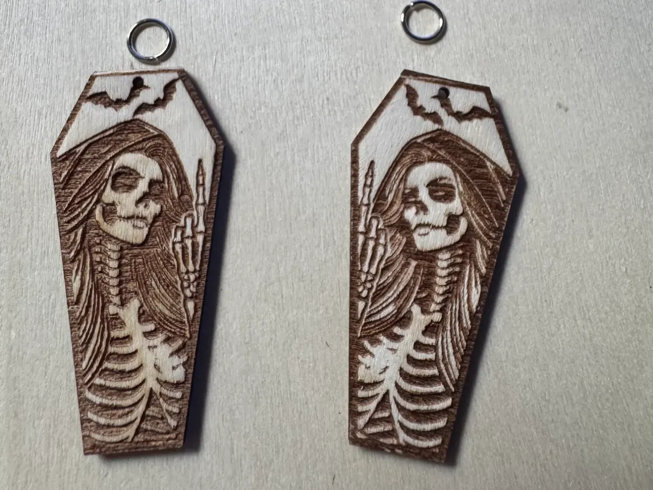 [Laser cut and engrave] Coffin Shaped Skeleton Earrings with Bat Motif