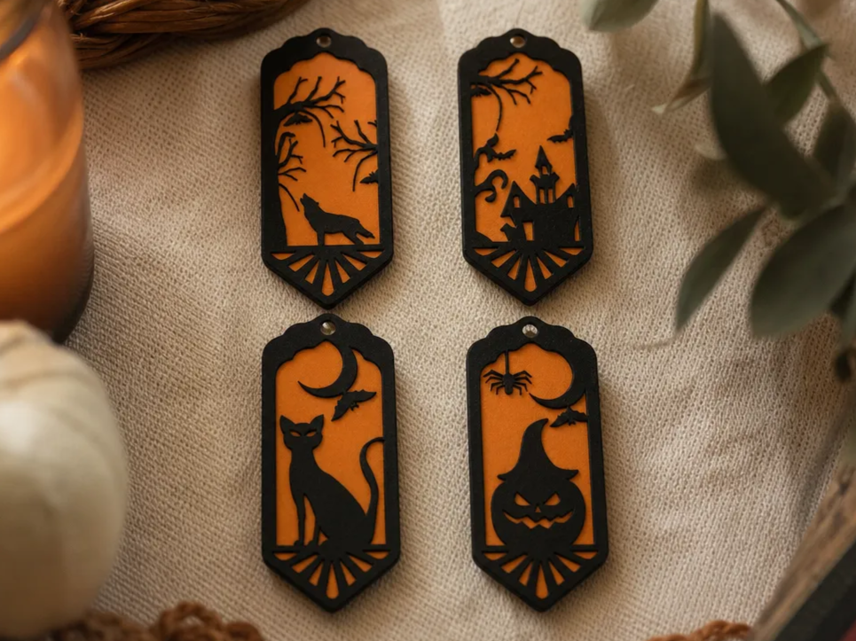 Halloween Themed Hanging Ornaments Featuring Spooky Scenes