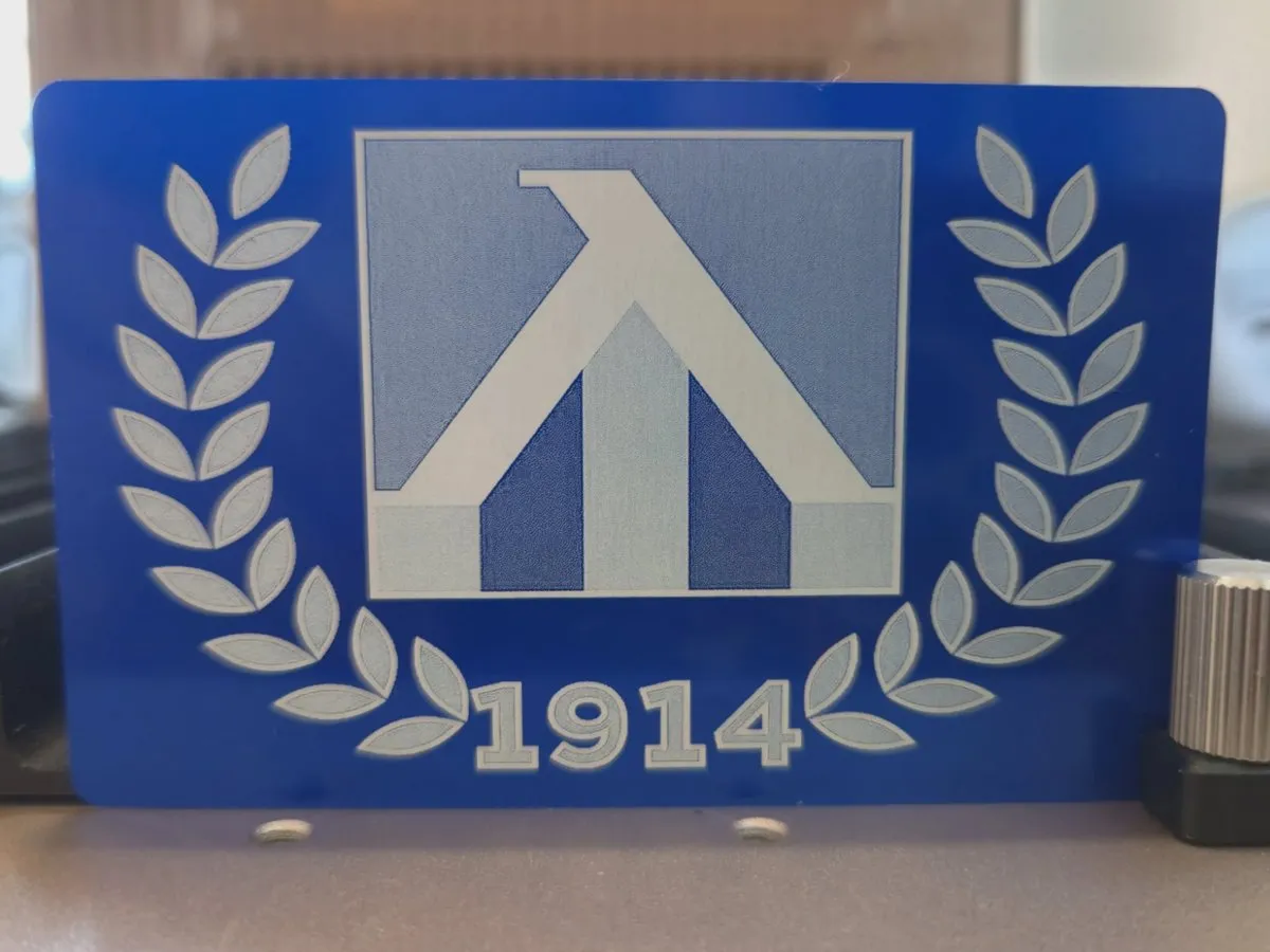 [Laser cut and engrave] Blue rectangular plaque featuring a lambda symbol and 1914 date with laurel wreath